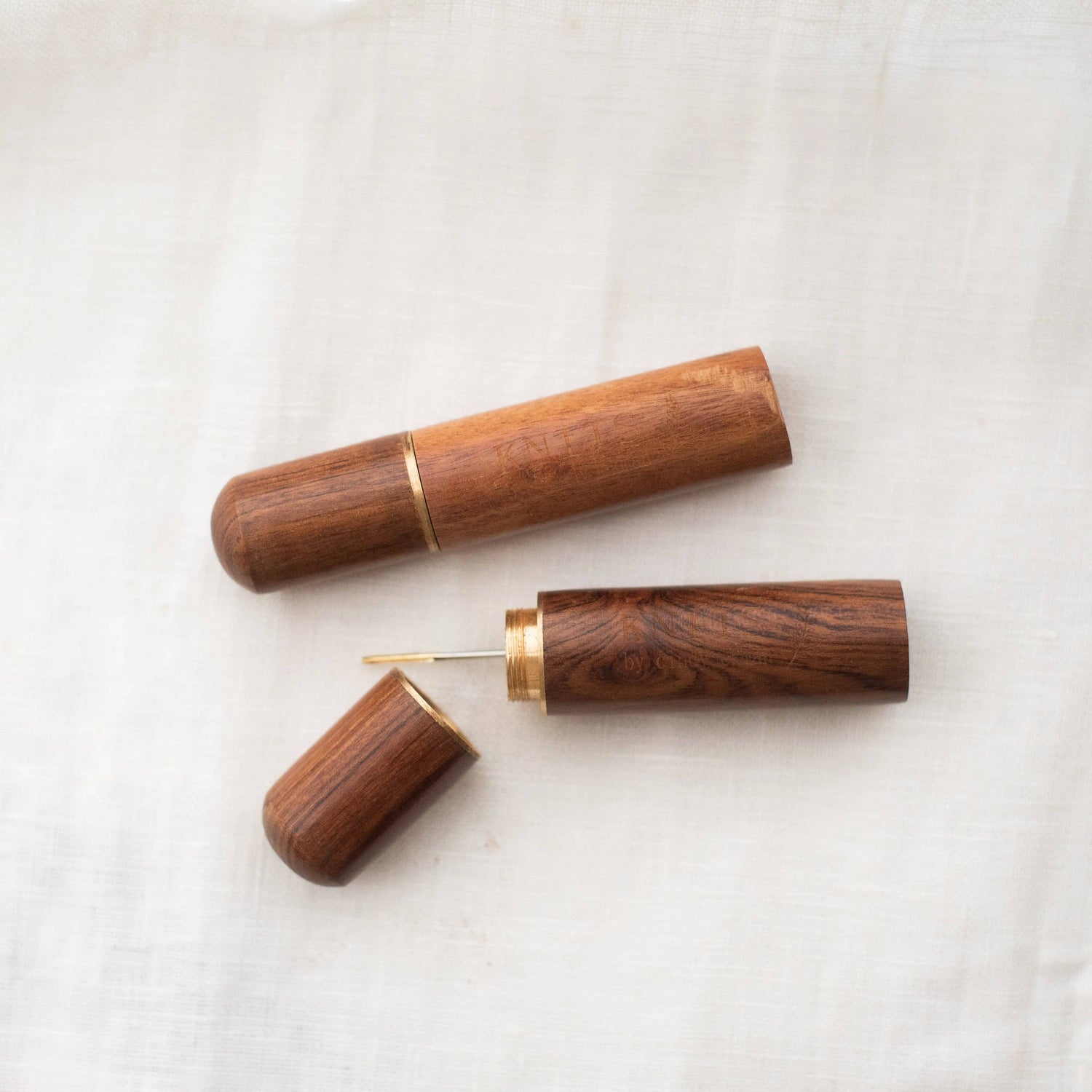 The KNITS wooden needle tube + needle